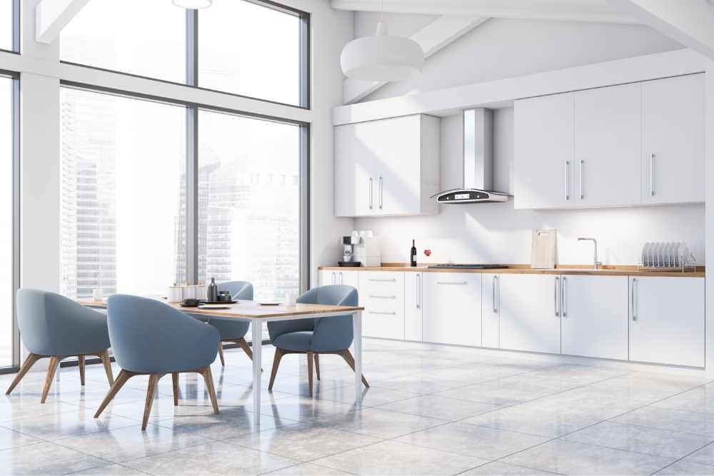 Beautiful white ceramic tile flooring in a dining and kitchen area near Kenner, Louisiana (LA)